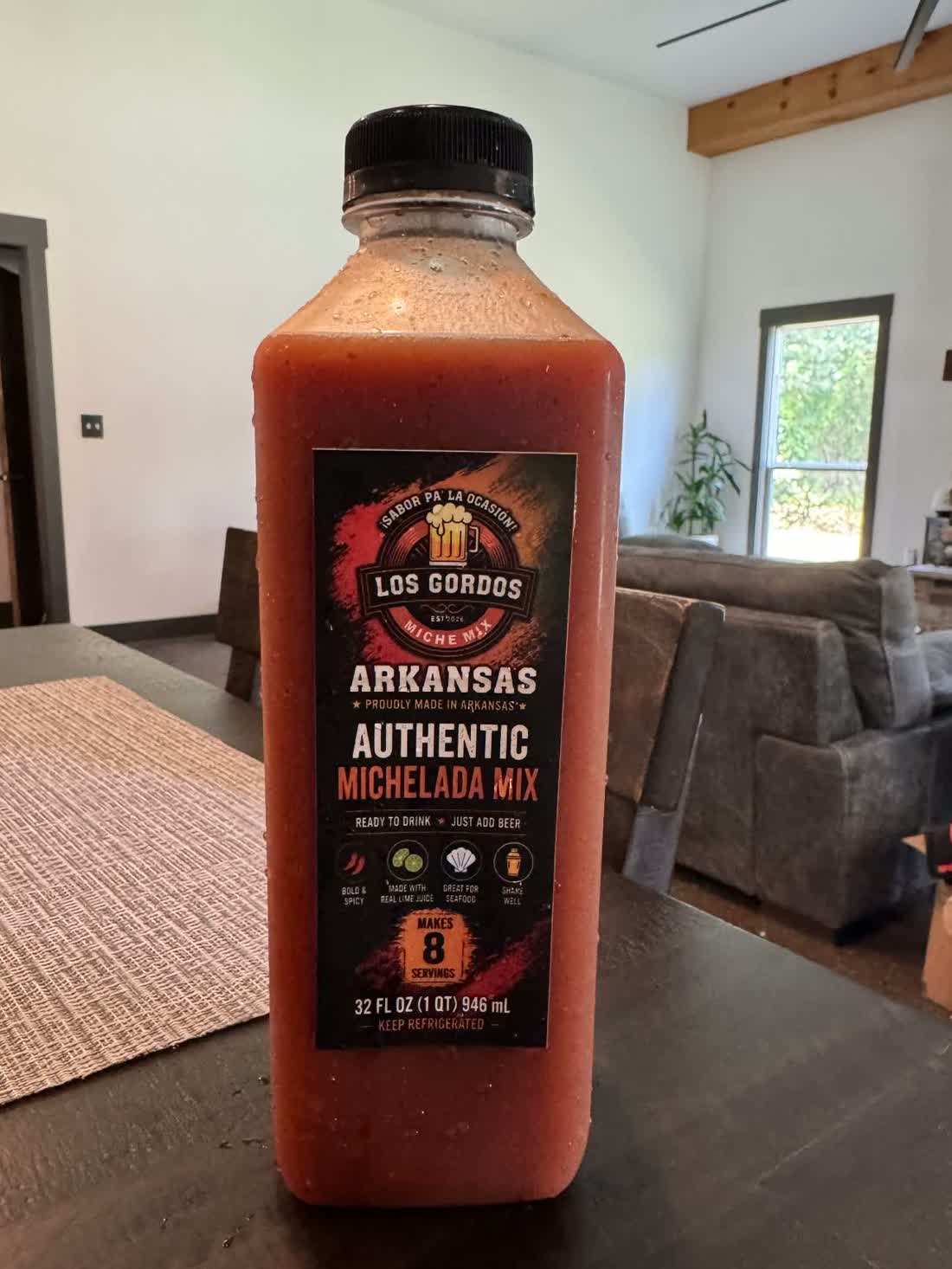 Botella real de Los Gordos Miche Mix de 32 FL OZ con su etiqueta Arkansas